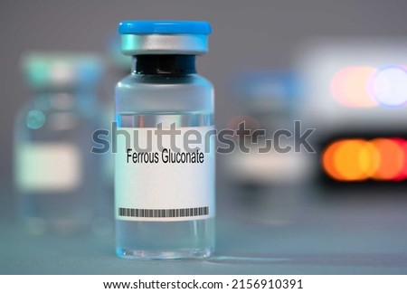 Ferrous Gluconate. Ferrous Gluconate medical liquid for injection in a glass vial Royalty-Free Stock Photo #2156910391