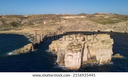 Aerial view of Fungus Rock in Dwejra Bay, Gozo.