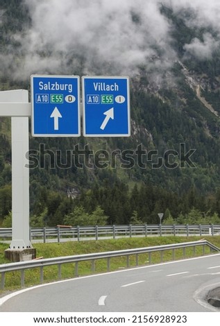Road sign near the Border between Italy and Austria with name of the City SALZBURG and VILLACH