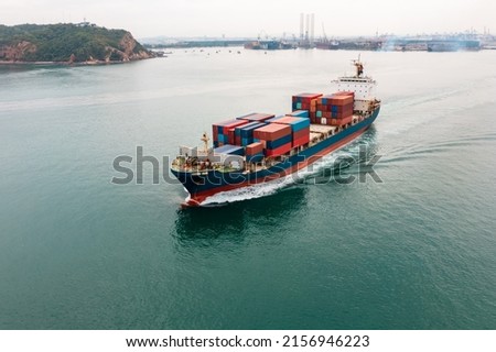Container ship transporting cargo logistic import and export goods internationally around the world, including Asia Pacific and Europe, Aerial view photograp from drone 