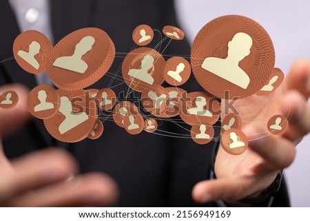 A group of 3D rendered people icons hovering between a man's hands