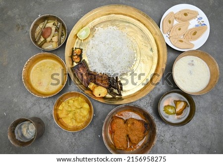 Traditional Bengali cuisine and food meal thali of West Bengal, India. Bengali food thali in kolkata. bengali thali for puja and Pailaboishakh. popular food kolkata. Royalty-Free Stock Photo #2156958275