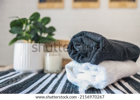Clean stack of towels in the bathroom.