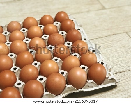 Picture of paper tray with holes for putting eggs for sale, healthy food