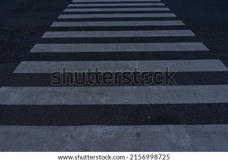 Zebra Cross or symbol of a place for crossing for pedestrians.