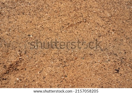 Sharp sand. Construction sand for laying paving slabs. Closeup shot of sand Royalty-Free Stock Photo #2157058205