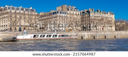 Paris, beautiful buildings avenue de New York, an upscale neighborhood on the quays, with view on the Seine and a houseboat