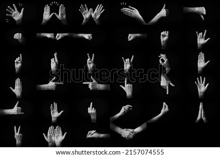 Dramatic black and white image of hand emojis collection isolated on black background