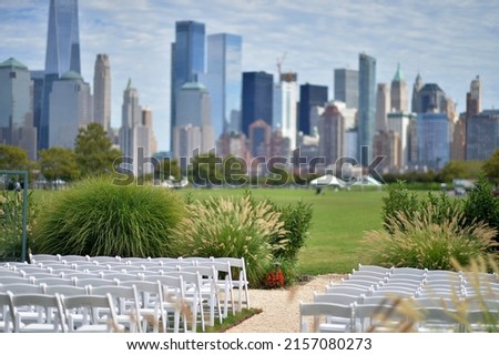 New York city skyline. USA. Chairs on the lawn