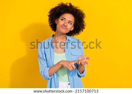 Photo of pensive uncertain suspicious lady count fingers look empty space wear denim shirt isolated yellow color background Royalty-Free Stock Photo #2157100713
