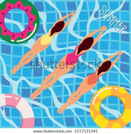 women swimming in the pool with floats