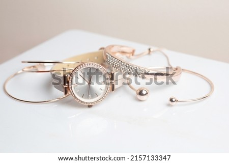 trendy women watch with bracelet and bangle set, fashionable watch and jewellery 
 Royalty-Free Stock Photo #2157133347