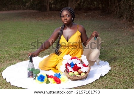 picnic pictures on a park with fruit and drink 