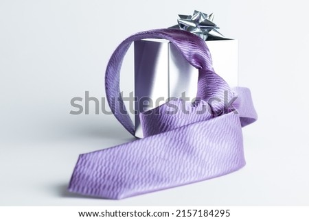 The representation of Father's Day with still life - tie and gift box Royalty-Free Stock Photo #2157184295