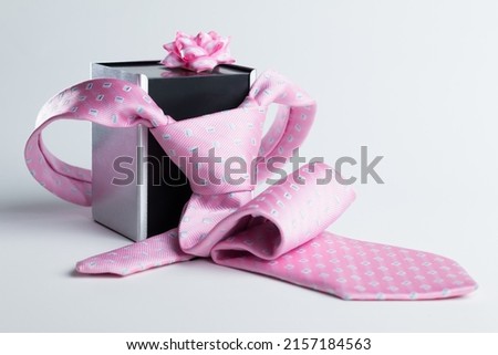 The representation of Father's Day with still life - tie and gift box Royalty-Free Stock Photo #2157184563