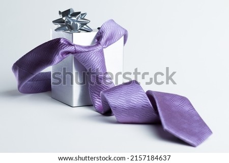 The representation of Father's Day with still life - tie and gift box Royalty-Free Stock Photo #2157184637