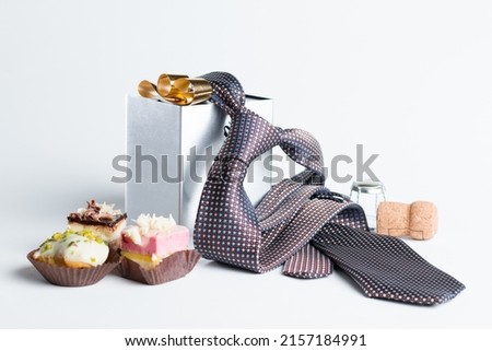 The representation of Father's Day with still life - tie, gift box and other items Royalty-Free Stock Photo #2157184991