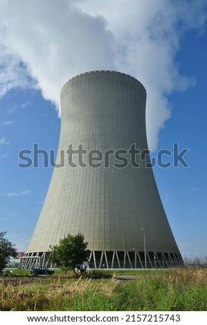 A vertical shot of Temelin nuclear power plant with blue sky above, Czech Republic