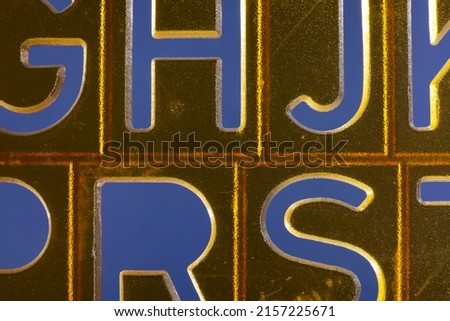 close-up letters on plastic ruler

