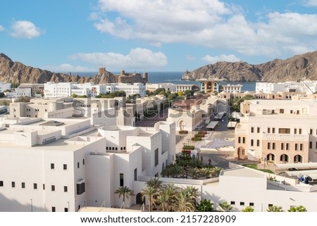 Muscat, Oman - capital and most populated city in Oman, Muscat displays amazing spots where its white buildings are surrounded by impressive mountains and rock formations Royalty-Free Stock Photo #2157228909