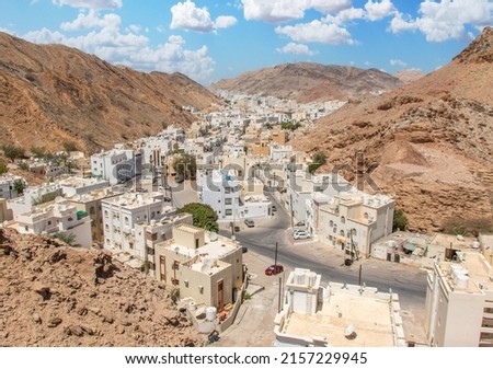 Muscat, Oman - capital and most populated city in Oman, Muscat displays amazing spots where its white buildings are surrounded by impressive mountains and rock formations Royalty-Free Stock Photo #2157229945