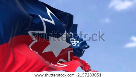 The Juneteenth flag waving in the wind. Juneteenth is a federal holiday in the United States commemorating the emancipation of enslaved African-Americans Royalty-Free Stock Photo #2157233051