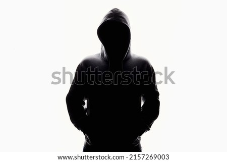 Man in Hood silhouette. Boy in a hooded sweatshirt. Isolate Royalty-Free Stock Photo #2157269003