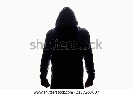 Man in Hood silhouette. Boy in a hooded sweatshirt Isolated on white Background