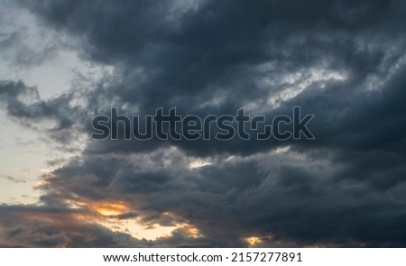 Beautiful bright dramatic sunset with clouds after rain. Royalty-Free Stock Photo #2157277891