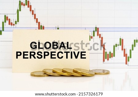 Business concept. Against the background of the quotes chart, a business card with the inscription - Global Perspective