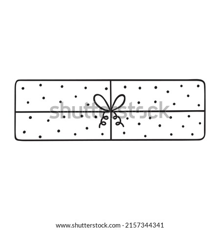 Hand drawn gift box doodle.  Present box with bow and ribbon in sketch style. Vector illustration isolated on white background.