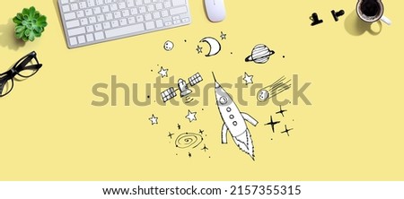 Dream of space and rocket with a computer keyboard and a mouse
