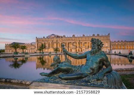 Garden of Chateau de Versailles, near Paris in France at sunset Royalty-Free Stock Photo #2157358829