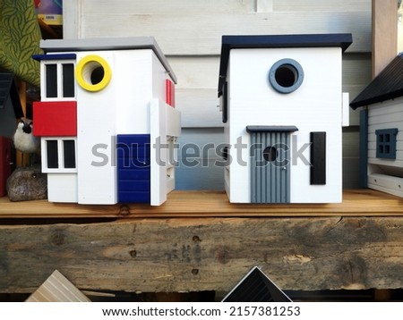 a photo of small white toy houses