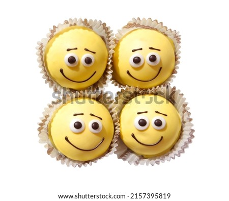 donuts made in the form of emoticons isolated on a white background.