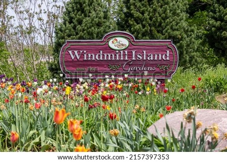 Windmill Island gardens sign at the entrance in Holland, Michigan during spring time.
