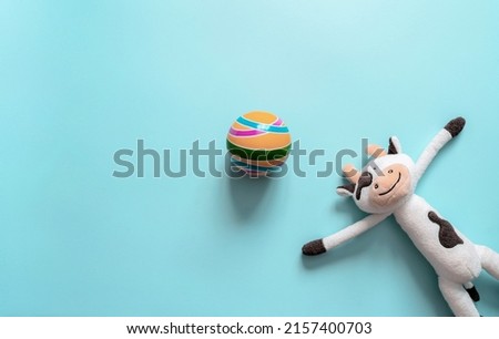 Kids toys on the turquoise background