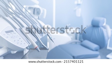 Banner dentists room office. Closeup different dental instruments and tools, blue toning. Royalty-Free Stock Photo #2157401121