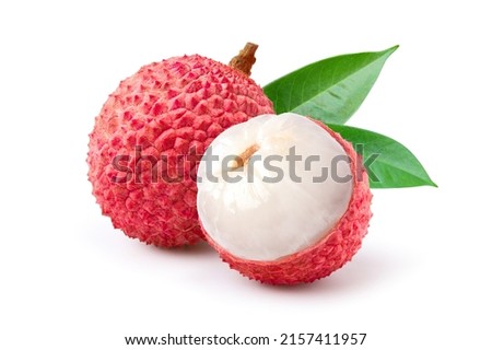 Juicy Lychee with cut in half and leaves  isolated on white background. Clipping path. Royalty-Free Stock Photo #2157411957