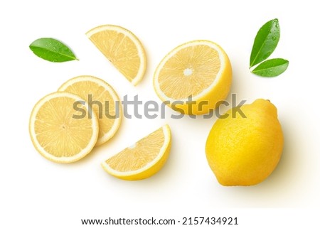 Whole and half sliced lemon with green leaves isolated on white background. Top view. Flat lay. Royalty-Free Stock Photo #2157434921