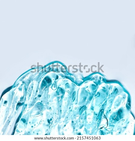 Gel serum texture with transparent micro bubble on white background by focused on microscope and copy space