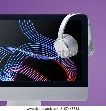 Computer with sound waves video and wireless headphones, online video and music entertainment