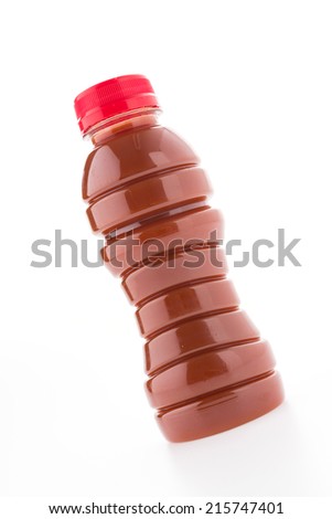 Tomato juice bottle isolated on white background