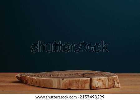 Wooden desk and copy space with navy background