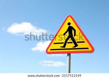 Traffic sign Pedestrian Crossing Ahead against blue sky, space for text