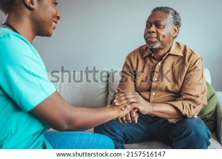 Professional care for elderly at nursing homes. Cropped shot of a female nurse hold her senior patient's hand. Close-up of home caregiver and senior woman holding hands