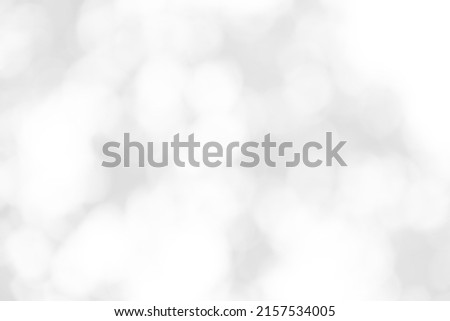 Abstract blur white and silver background with soft shimmer for display,White bokeh, abstract background