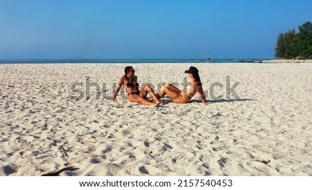 A photo of two girls from the UK relaxing on a holiday in Koh Samui, Thailand, Asia