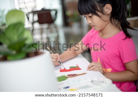 Girl PaintingGirl Painting Picture On Table At Home Picture On Table At Home