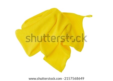 Yellow microfiber rag for cleaning and polishing various surfaces. Royalty-Free Stock Photo #2157568649